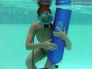 Hungarian beauty fucks a dildo submersed